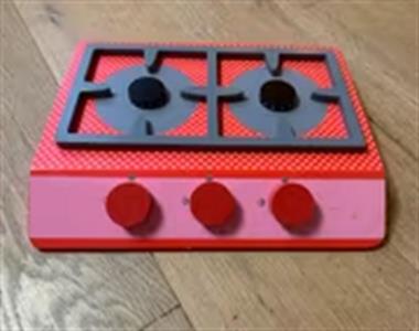 Houten fornuisje (attribuut)